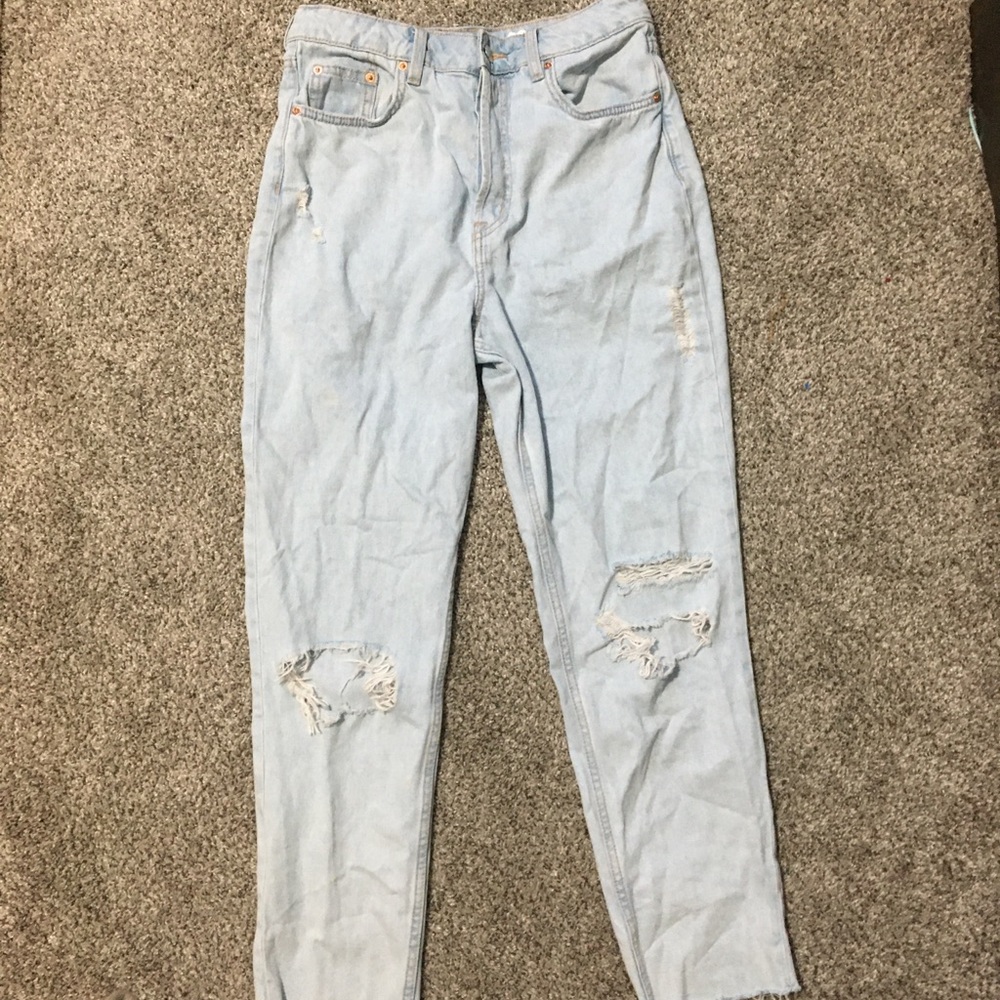 Sky blue ripped jeans